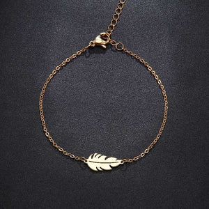 Women Stainless Steel Feather Shape Jewelry - Choice of Necklace, Bracelet,or Earrings